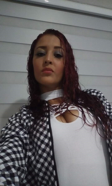 Intérprete QueenRedxxx Foto1