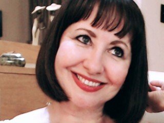 Image de profil du modèle de webcam SaucyMilfSophia