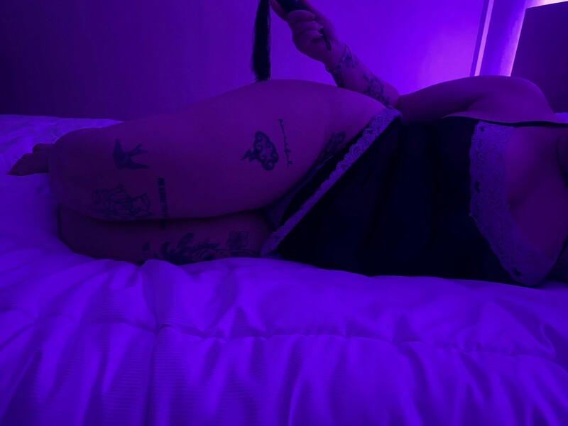 Utøver Roussetatouee Bilde 8