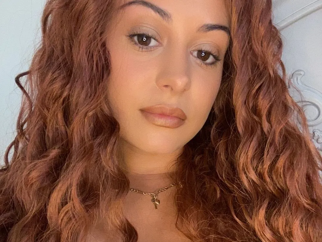 Imagen de perfil de modelo de cámara web de DollyMinxx