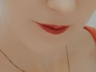 Image de profil du modèle de webcam SinfulRedhead