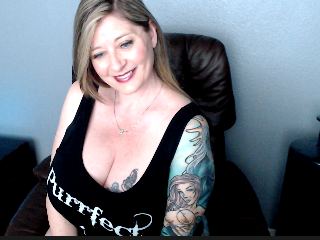 Imagen de perfil de modelo de cámara web de InkednCurvyBecky