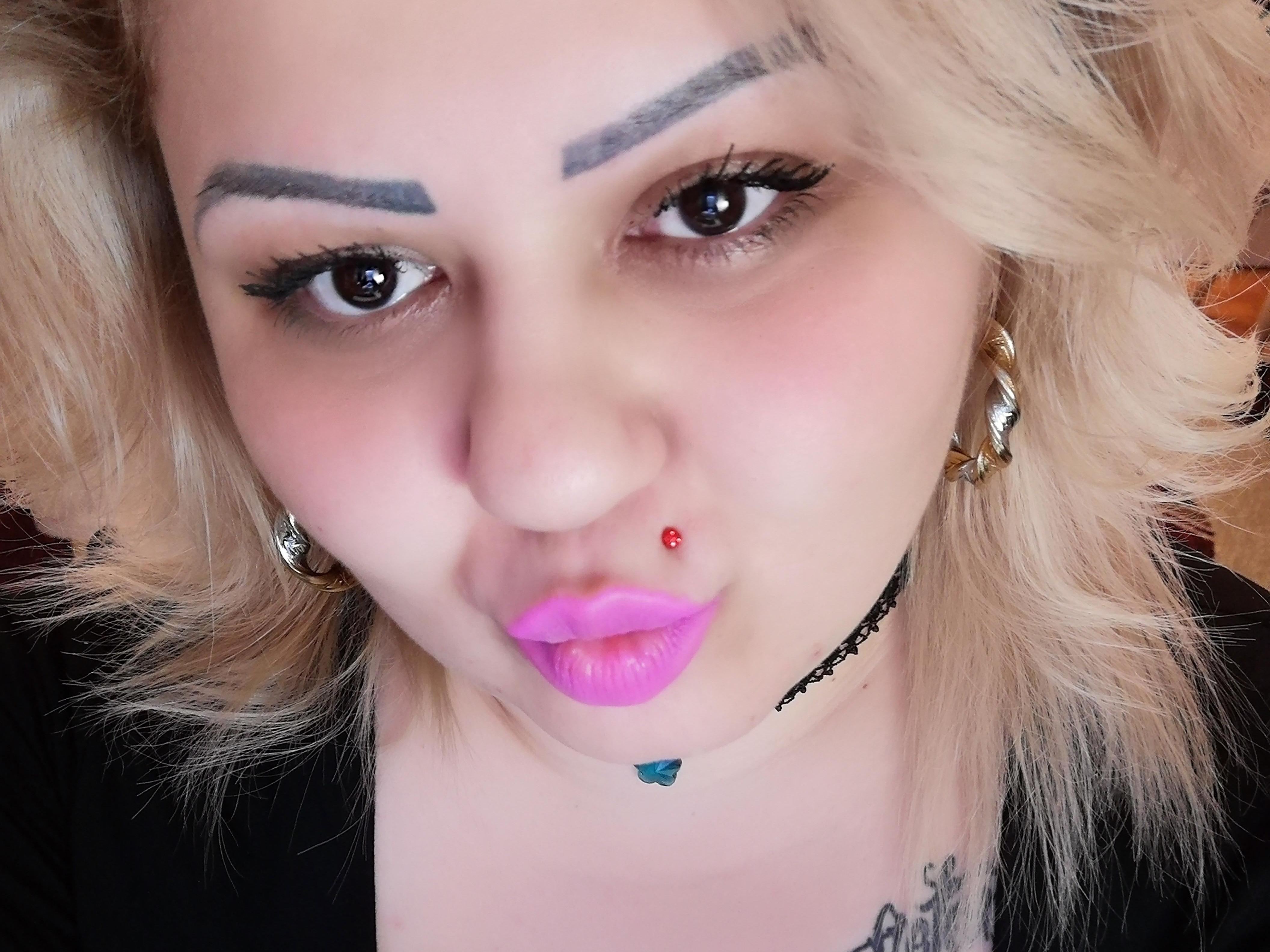 Image de profil du modèle de webcam QueenHotSquirt
